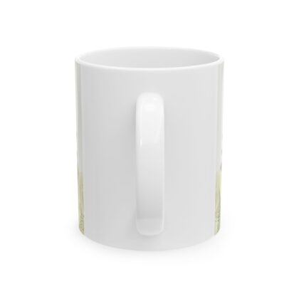 This is a standard coffee cup with a woodland image