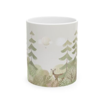This is a standard coffee cup with a woodland image